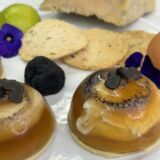 L’oeuf poché en gelée truffée sur sa royale de Foie gras